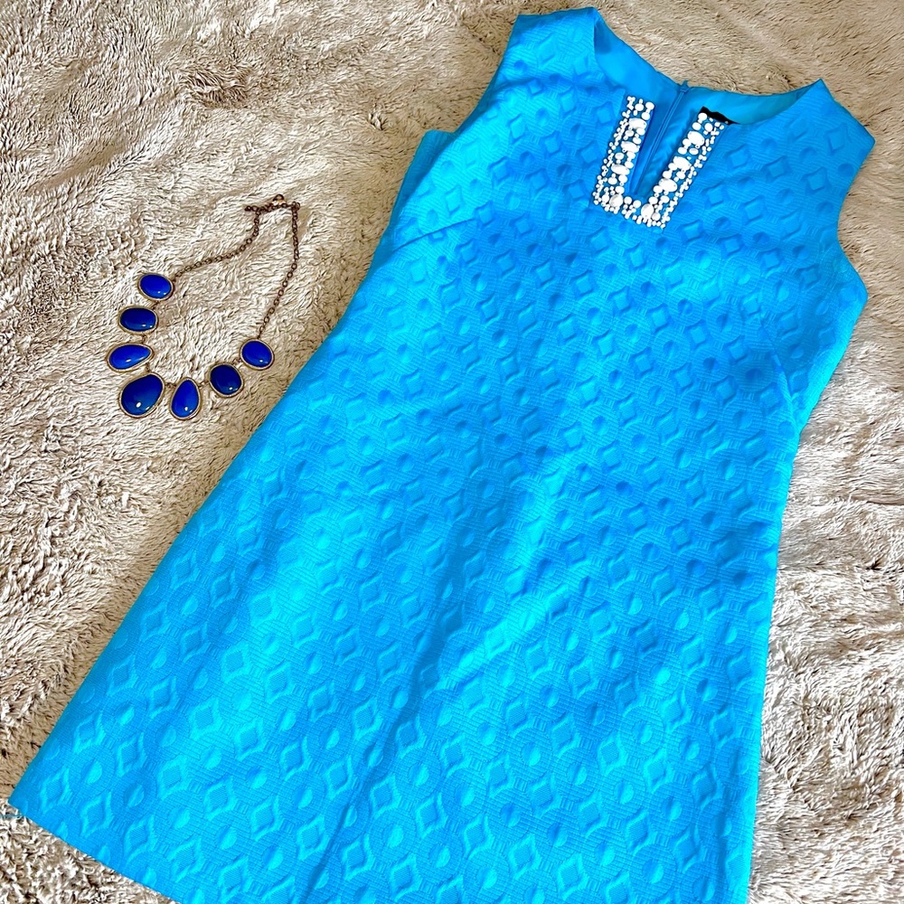 Ronni Nicole Blue Patterned Dress w/ White Shell Accents